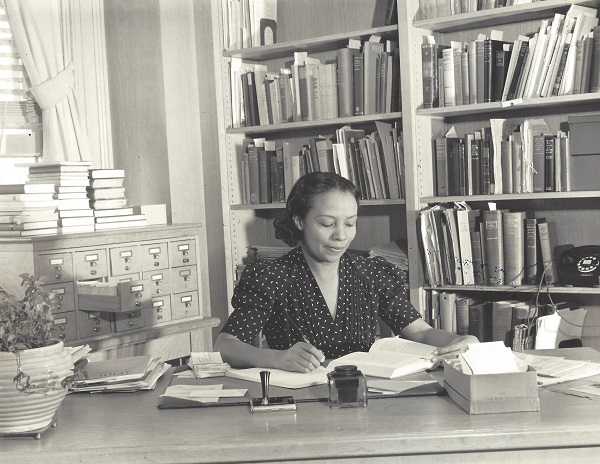 Dorothy Porter in 1939, at her desk in the Carnegie Library at Howard University.